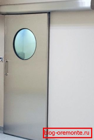 Kluzné ocelové dveře